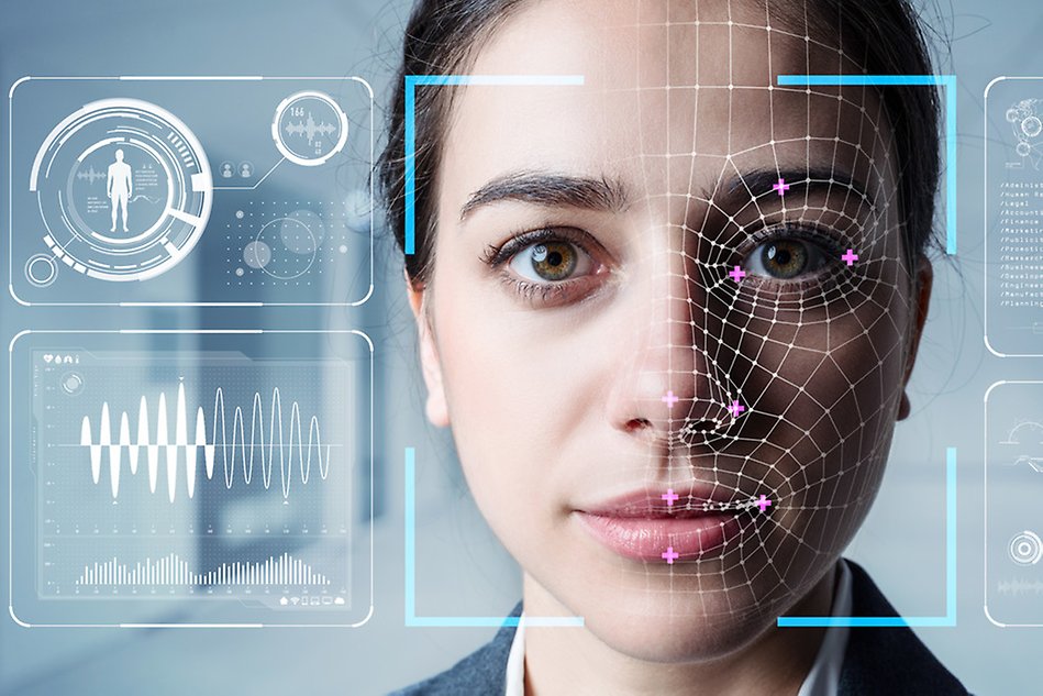 Close-up of a woman’s face with augmented reality biometric data.