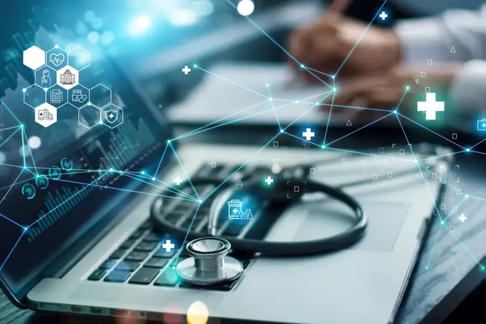 Image of a laptop and a stethoscope