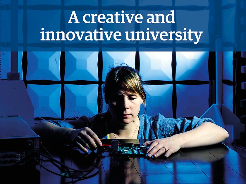 A woman is sitting at a table holding electrical equipment, the text "A creative and innovative university" is printed on top of the photograph.